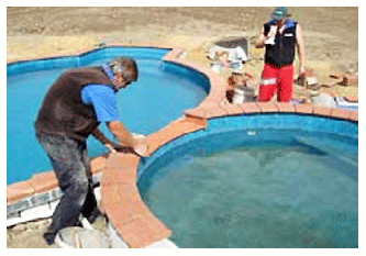 PHIL AND ASSISTANT FITTING SPA OVERFLOW POOL